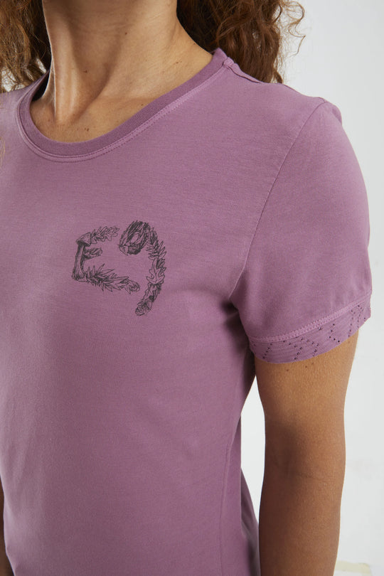 Purple t-shirt with a design on a white background