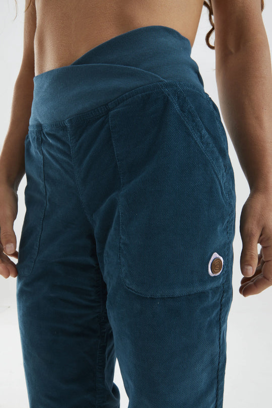Close-up of adjustable waistband and hem on Olly trousers – organic cotton outdoor wear