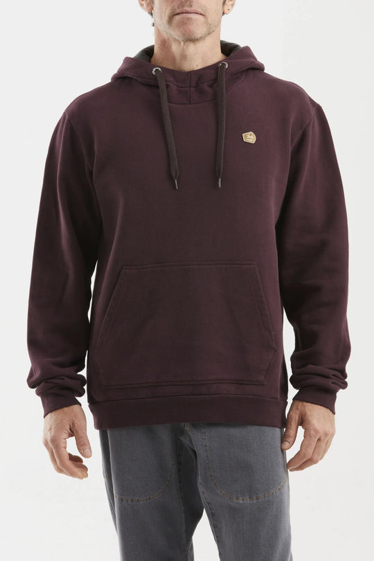 Man wearing a maroon hoodie with a small e9 logo on a white background